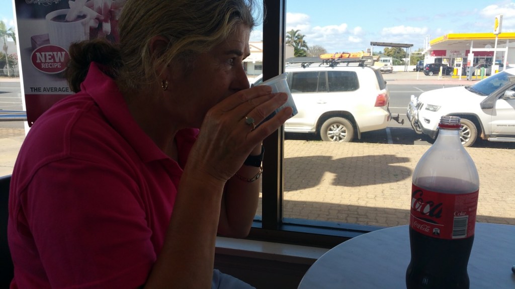 That's us in pensioner mode....sharing a bottle of coke and drinking it of plastic food containers supplied free!