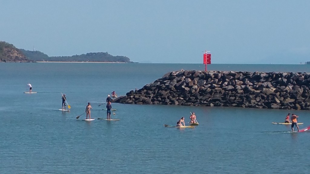 Paddle board lessons at the marina at Yorkeys Knob.