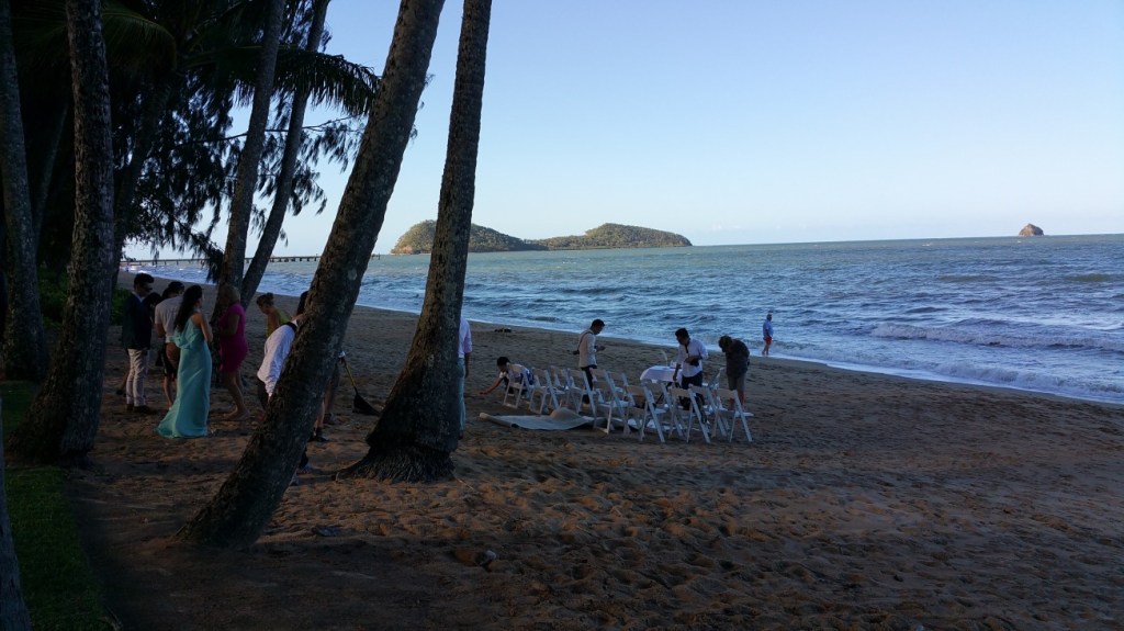 Palm Cove beach wedding (on a Wednesday night). The photo doesn't show it but the wind was blowing strongly, I hope it went well for them.